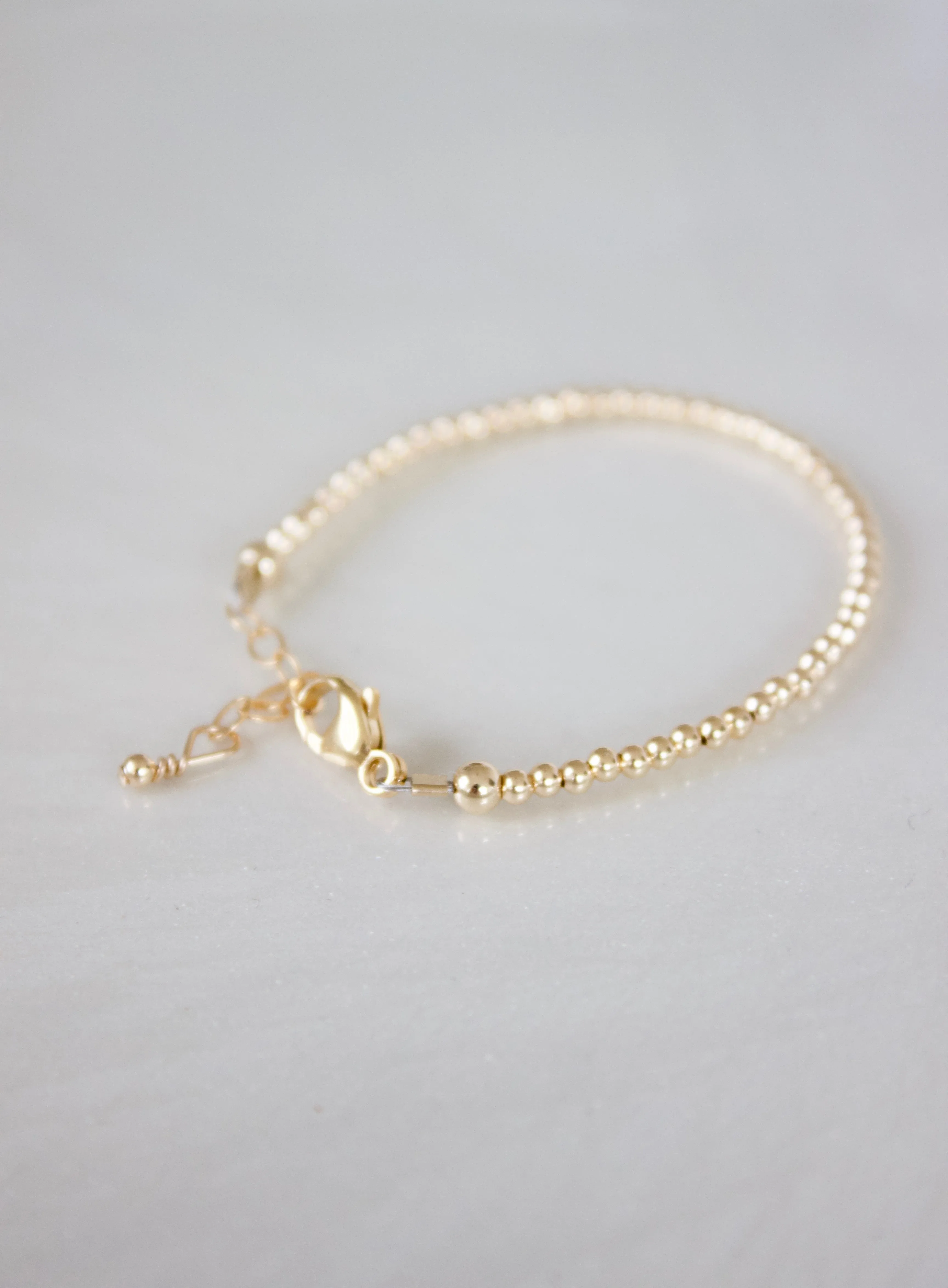 PETITE GOLD BABY BRACELET